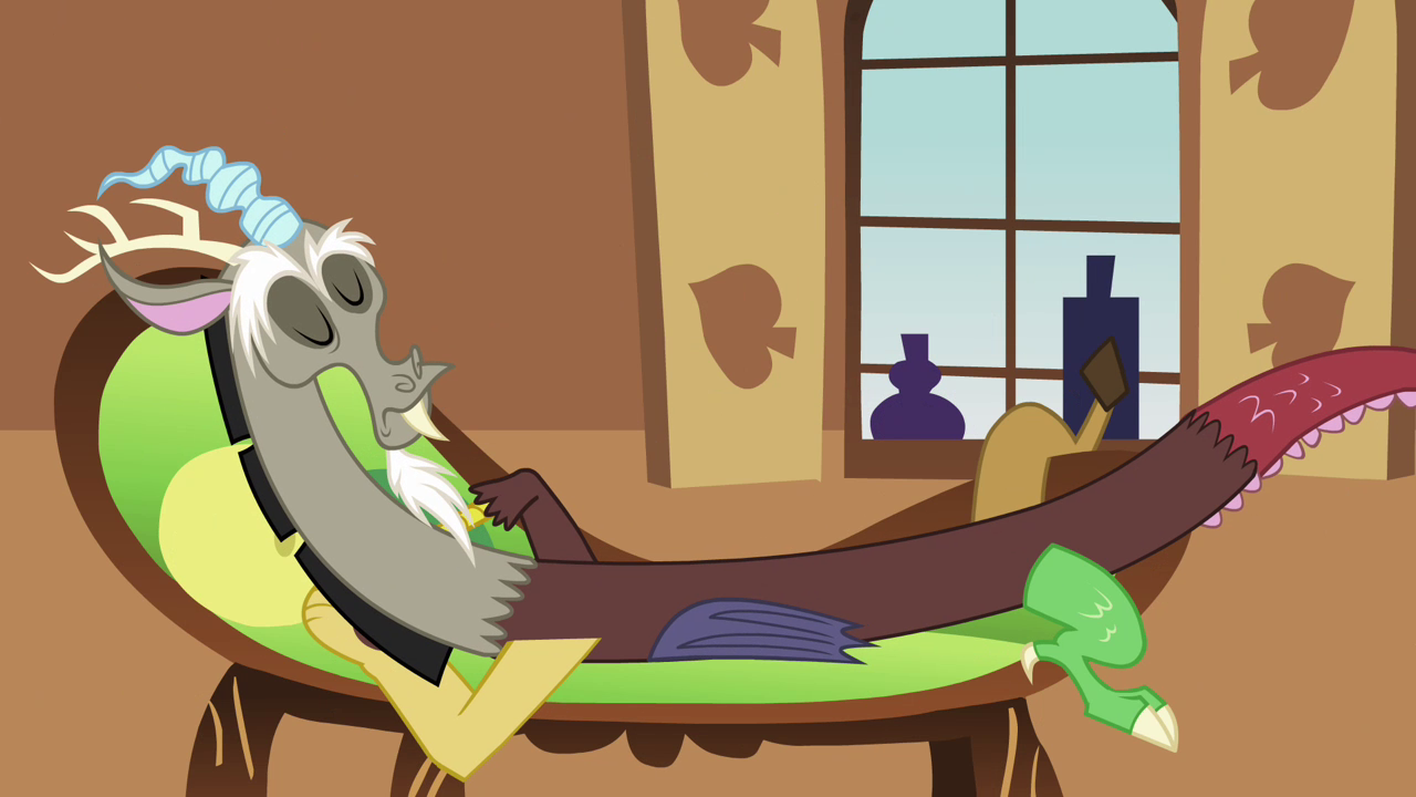 Discord laying haphazardly across a chaise lounge with his eyes closed.