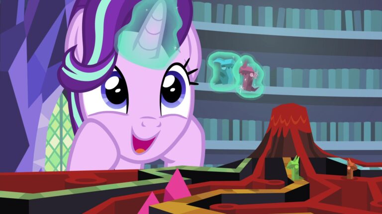 Starlight Glimmer excitedly playing a board game, using her magic to move two dragon tokens above a miniature volcano.